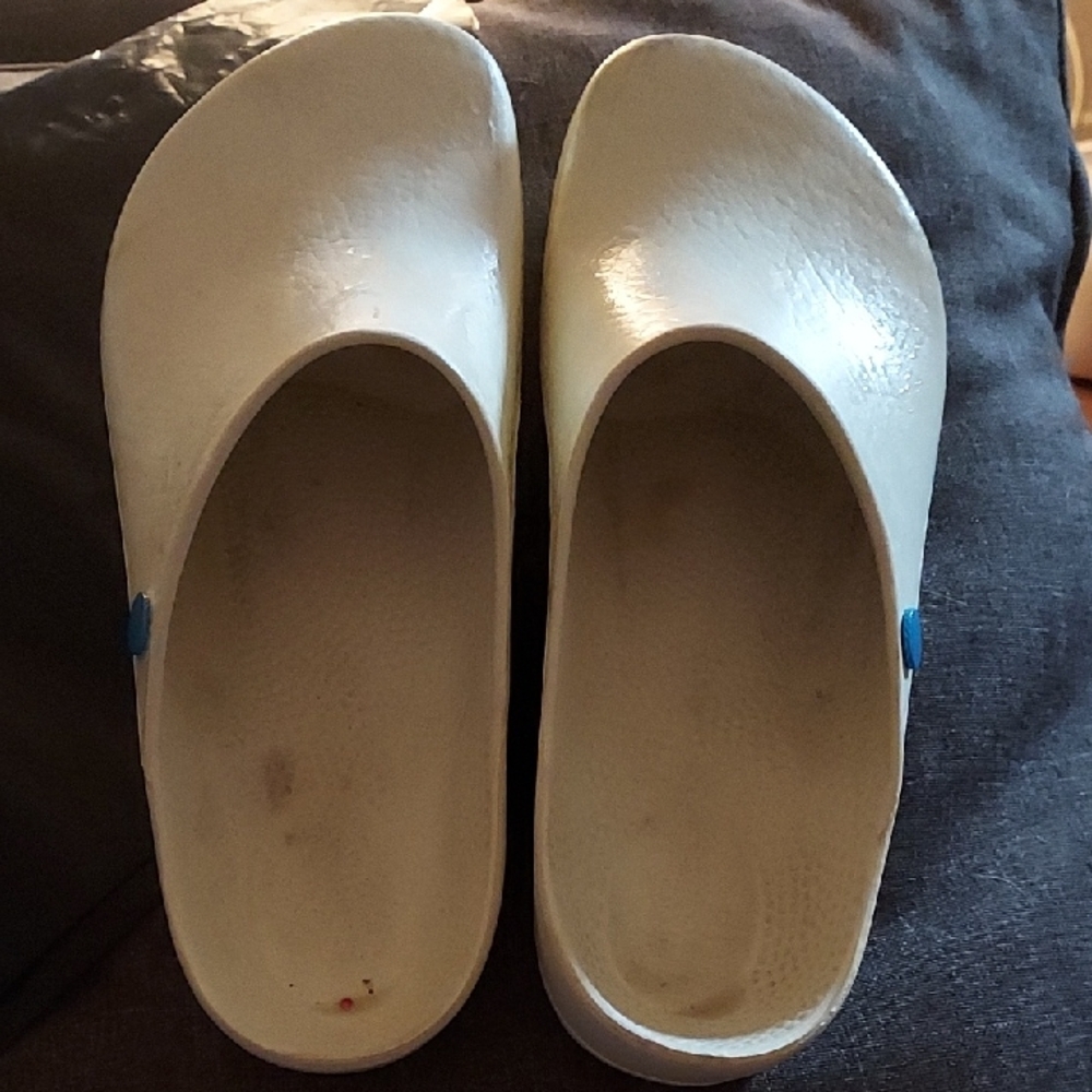Birkenstock Cream Slip-On Clogs with Blue Button